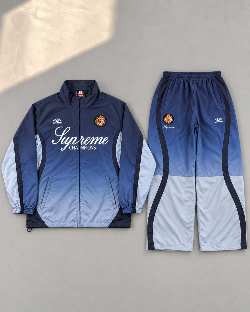 Niebieski Komplet Ortalionowy Supreme x Umbro Gradient